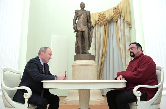 President Putin meets with US actor Steven Seagal