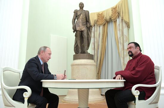 President Putin meets with US actor Steven Seagal