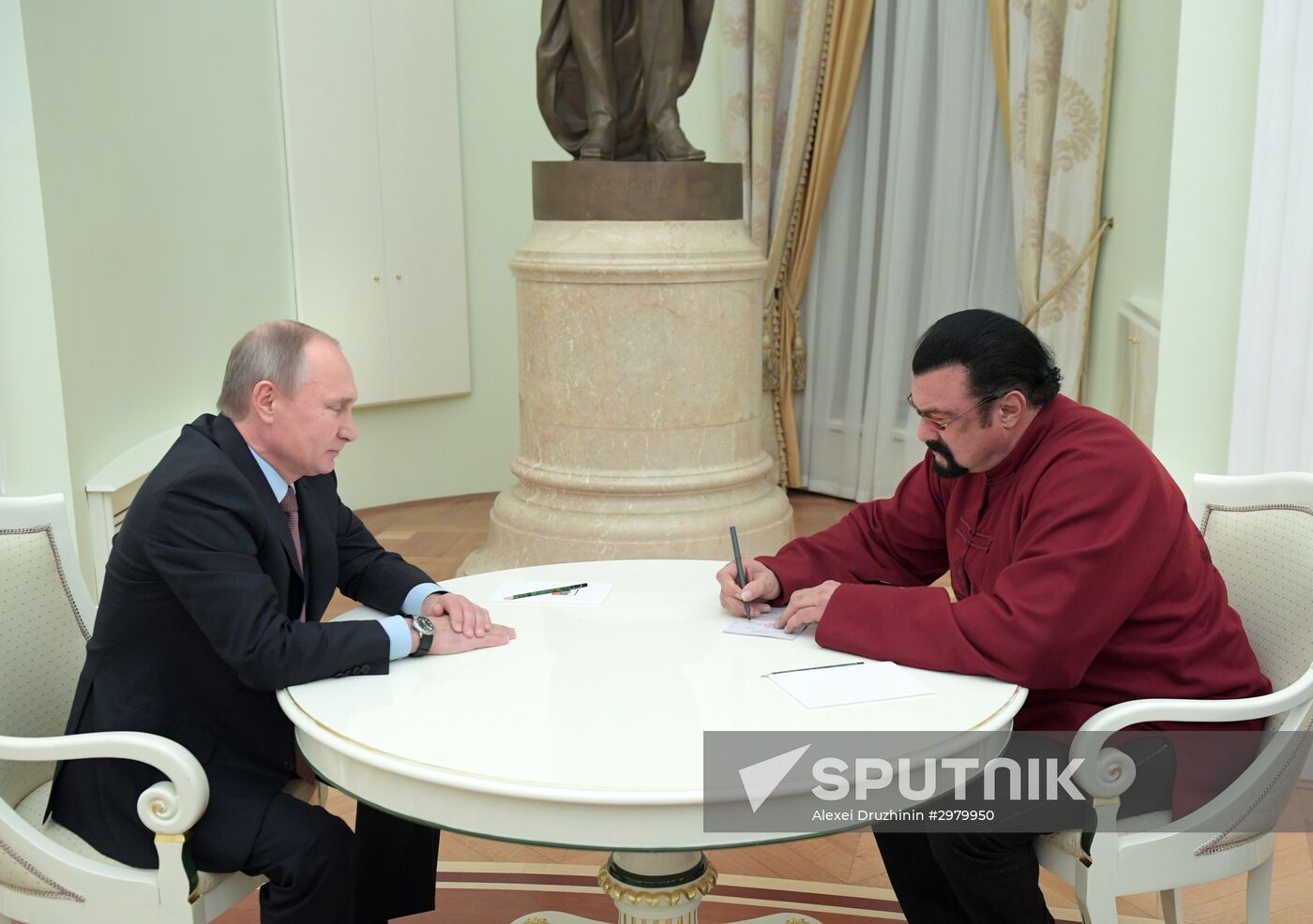 President Vladimir Putin meets with US actor Steven Seagal