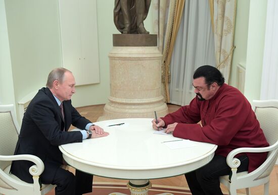 President Vladimir Putin meets with US actor Steven Seagal