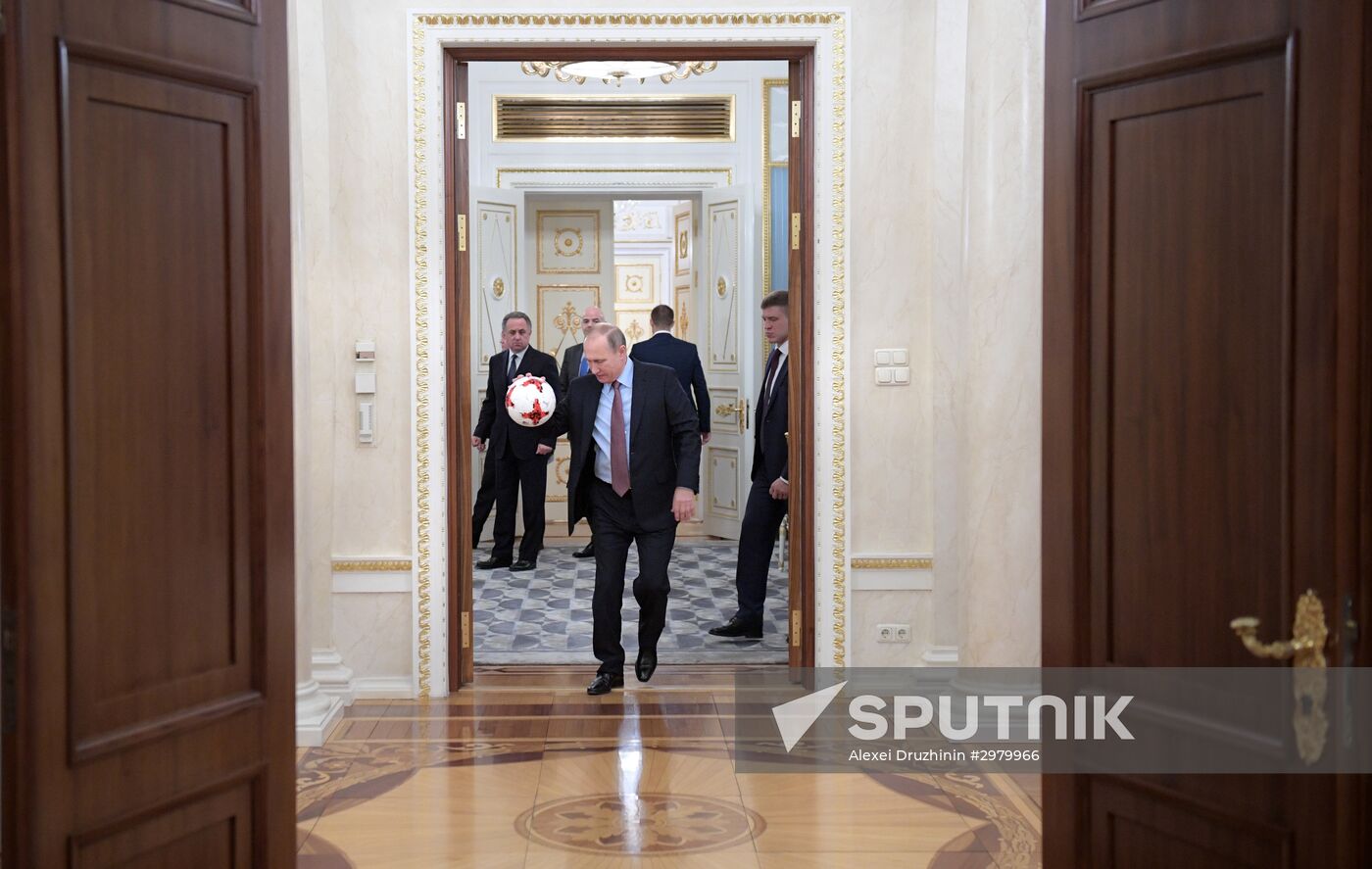 President Vladimir Putin meets with FIFA President Gianni Infantino