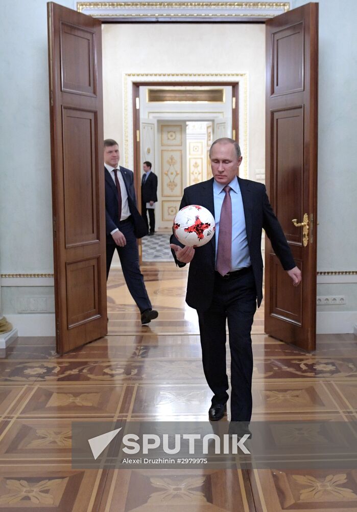 President Vladimir Putin meets with FIFA President Gianni Infantino