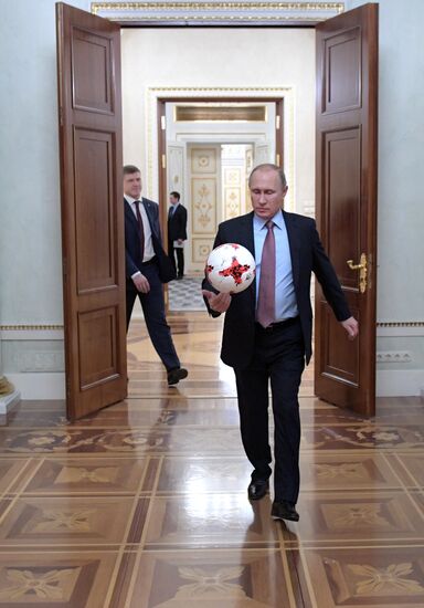 President Vladimir Putin meets with FIFA President Gianni Infantino