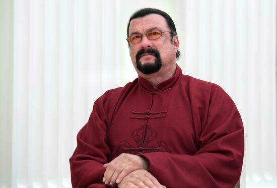 Vladimir Putin meets with American actor Steven Seagal