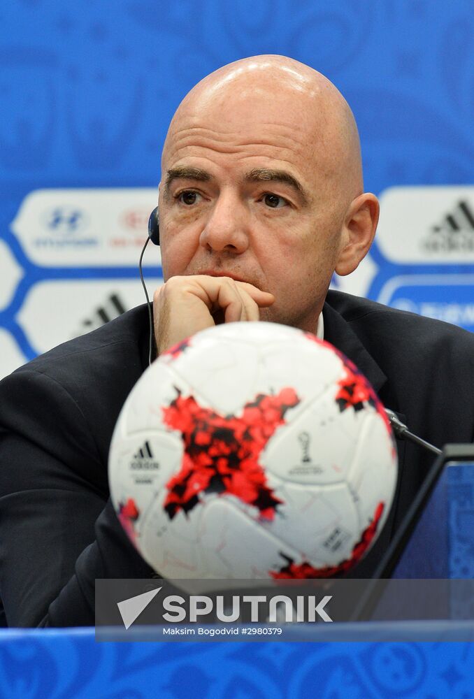 Gianni Infantino speaks with journalists before draft procedure of 2017 FIFA Confederations Cup