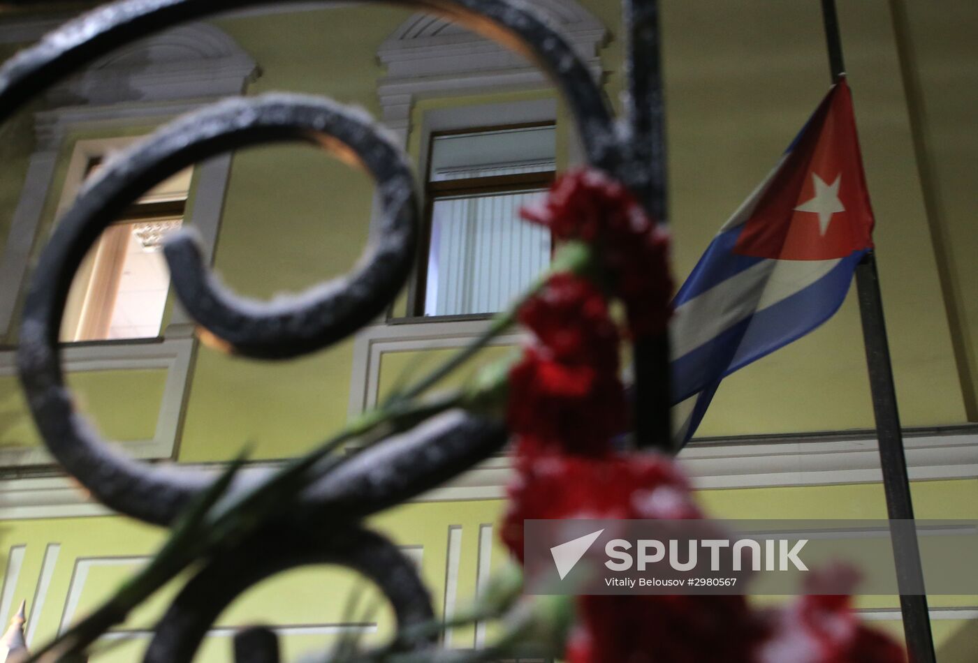 Moscow resident bring flowers to Cuban Embassy in memory of Fidel Castro