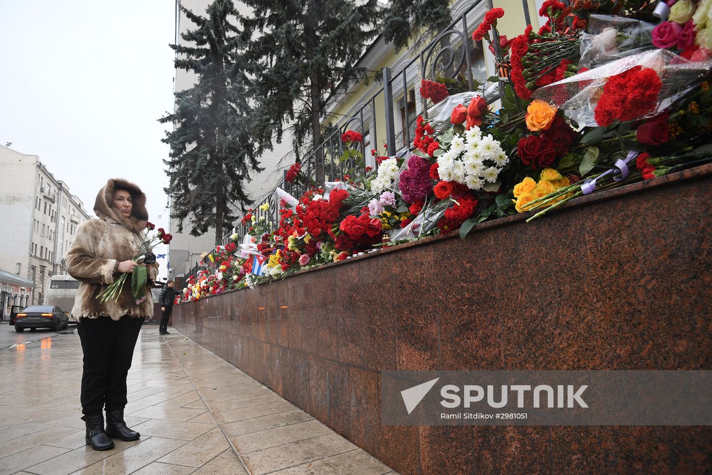 Moscow resident bring flowers to Cuban Embassy in memory of Fidel Castro