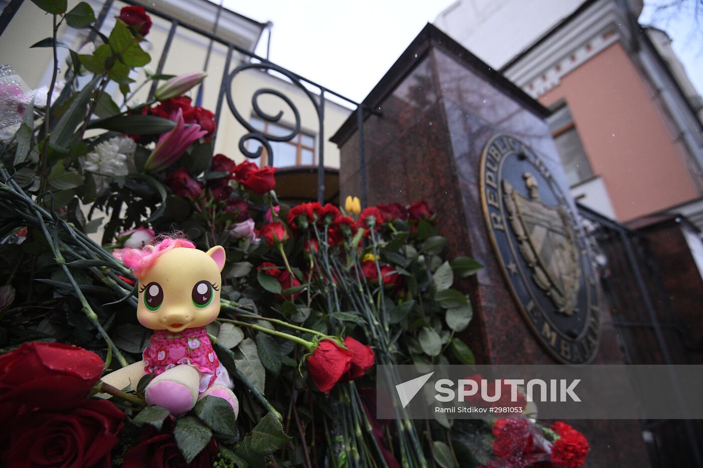 Moscow resident bring flowers to Cuban Embassy in memory of Fidel Castro