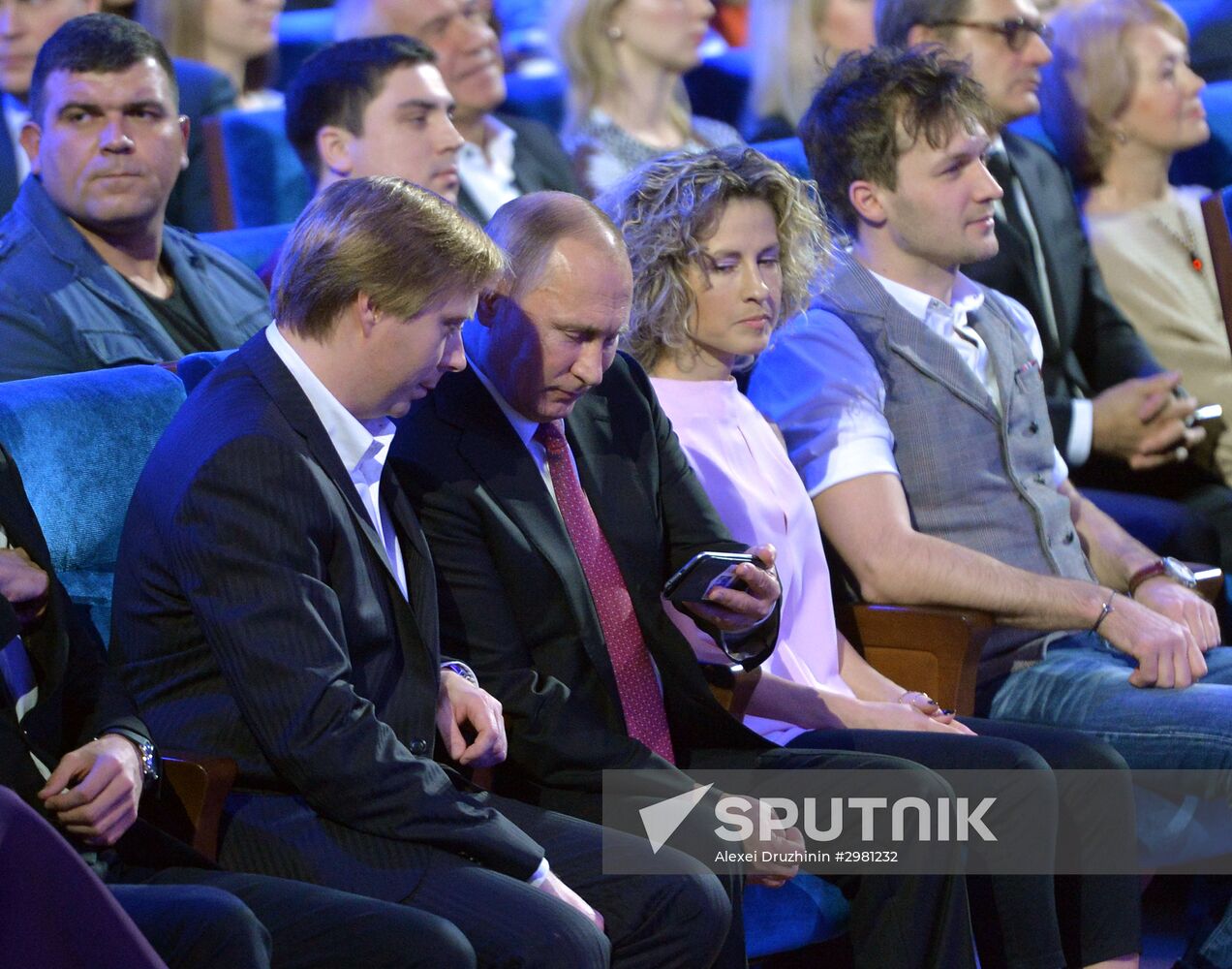 Vladimir Putin at anniversary KVN humor TV game show in Moscow