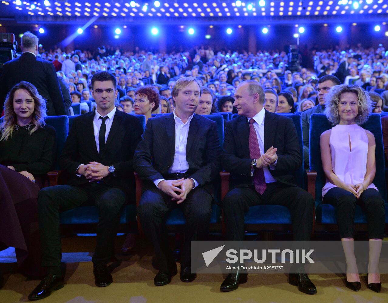 Vladimir Putin at anniversary KVN humor TV game show in Moscow