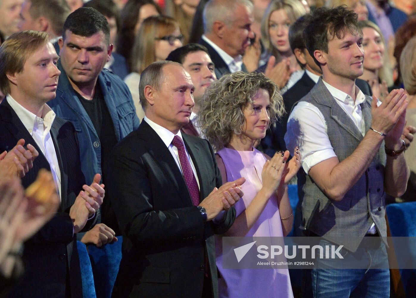 Vladimir Putin at anniversary KVN humor TV game show in Moscow