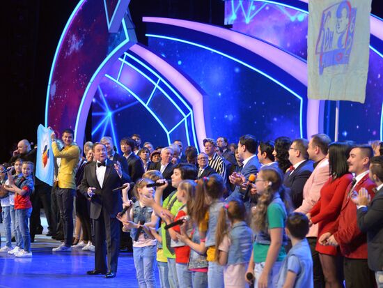 Vladimir Putin at anniversary KVN humor TV game show in Moscow