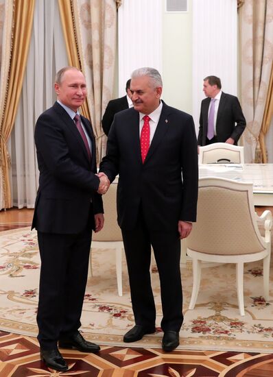 Russian President Vladimir Putin meets with Turkish Prime Minister Binali Yildirim