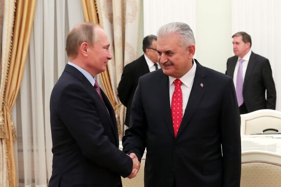 Russian President Vladimir Putin meets with Turkish Prime Minister Binali Yildirim