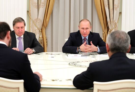 Russian President Vladimir Putin meets with Turkish Prime Minister Binali Yildirim
