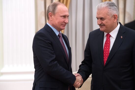 Russian President Vladimir Putin meets with Turkish Prime Minister Binali Yildirim
