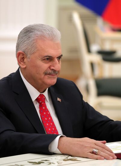 Russian President Vladimir Putin meets with Turkish Prime Minister Binali Yildirim