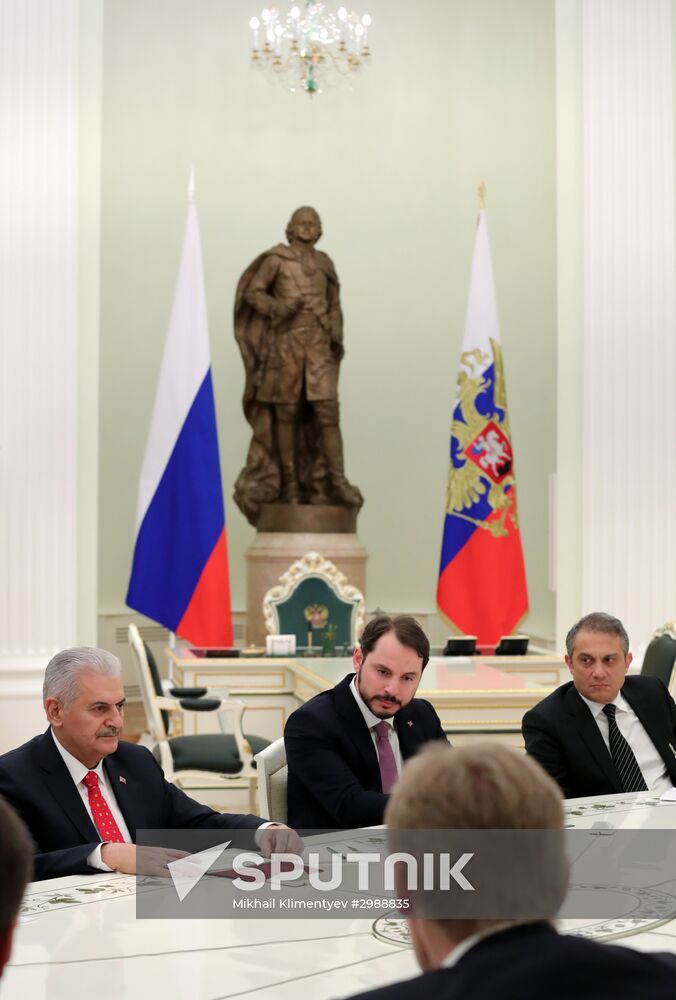 Russian President Vladimir Putin meets with Turkish Prime Minister Binali Yildirim