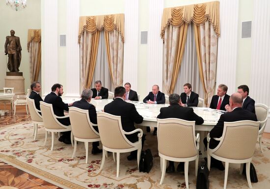 Russian President Vladimir Putin meets with Turkish Prime Minister Binali Yildirim