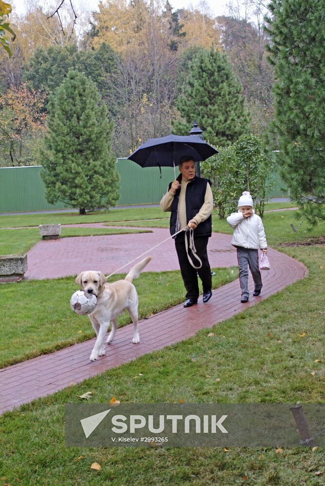 Boris Gromov on walk with daughter