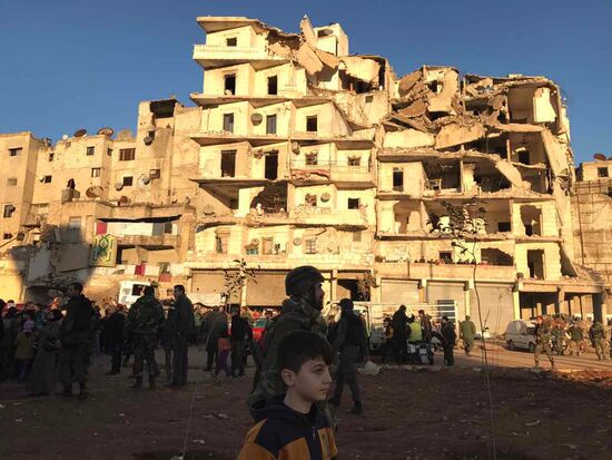 Aleppo residents after militants and their families leave eastern Aleppo