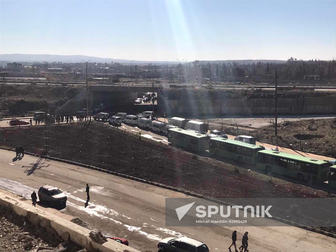 Aleppo residents after militants and their families leave eastern Aleppo