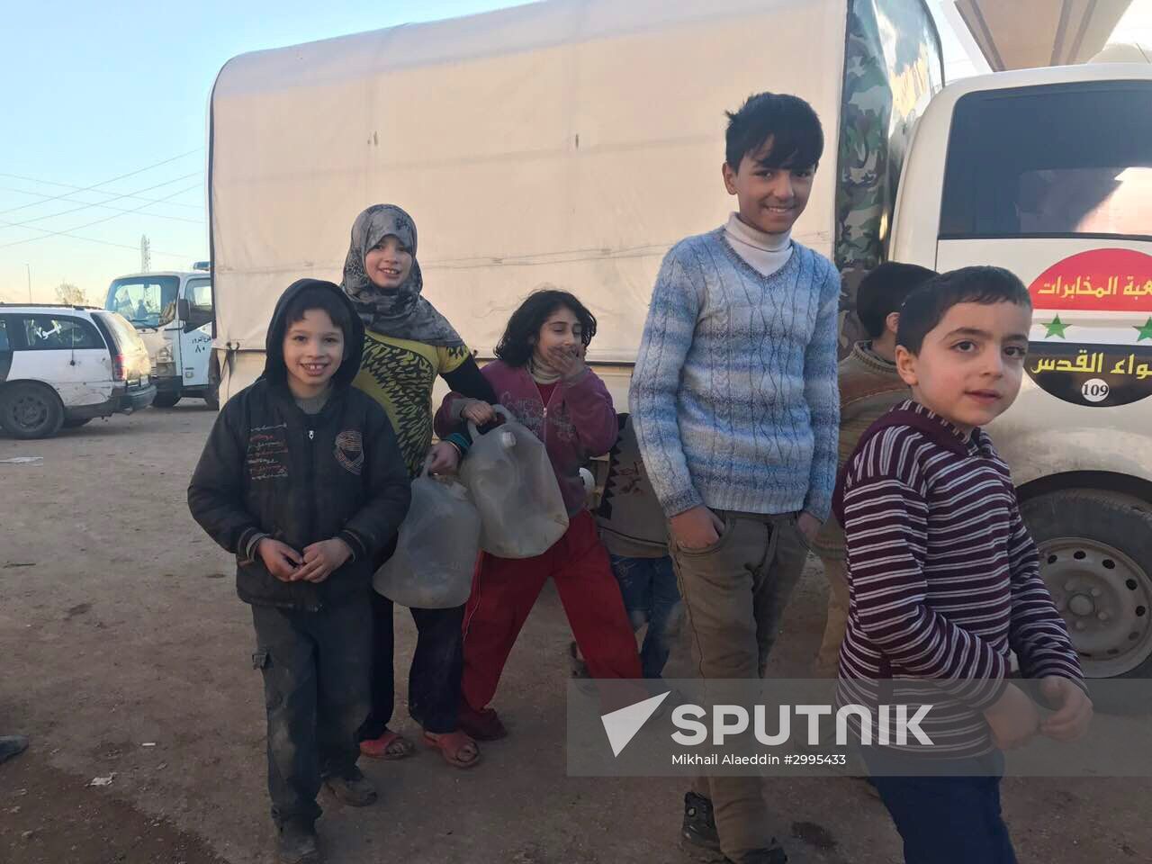 Aleppo residents after militants and their families leave eastern Aleppo