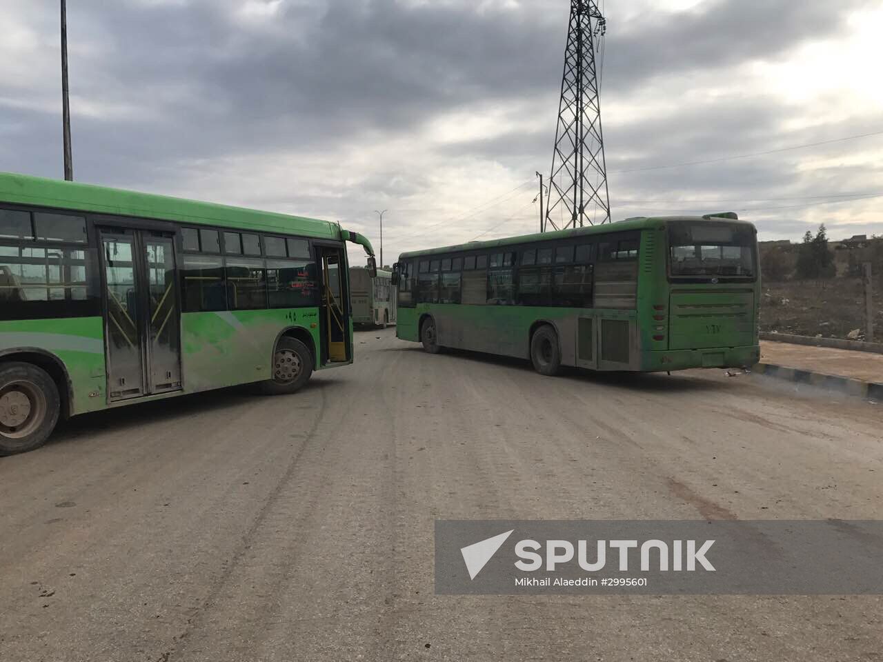 Militants and their families leave eastern Aleppo