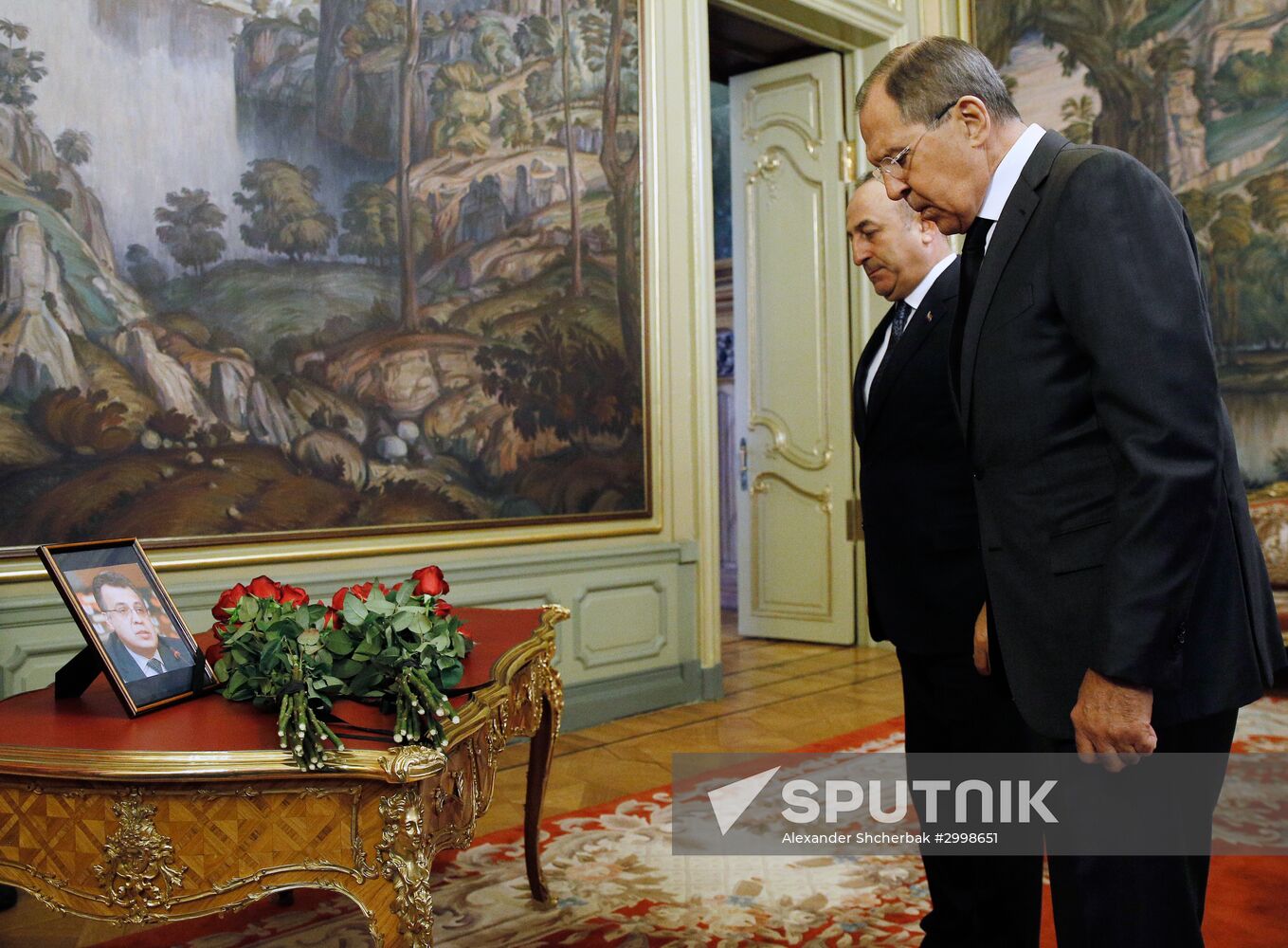 Russian, Iranian, Turkish Foreign Ministers lay flowers in memory of slain Ambassador Andrei Karlov