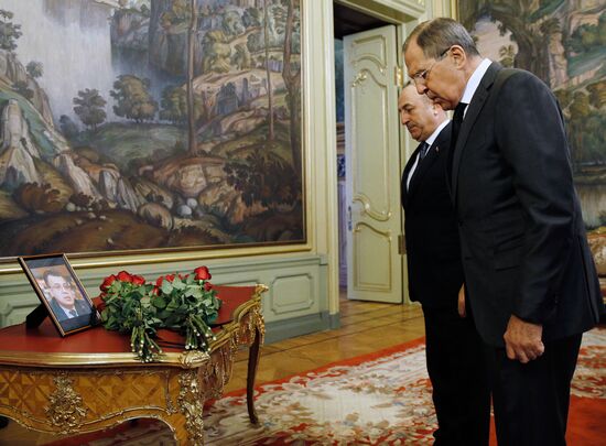Russian, Iranian, Turkish Foreign Ministers lay flowers in memory of slain Ambassador Andrei Karlov