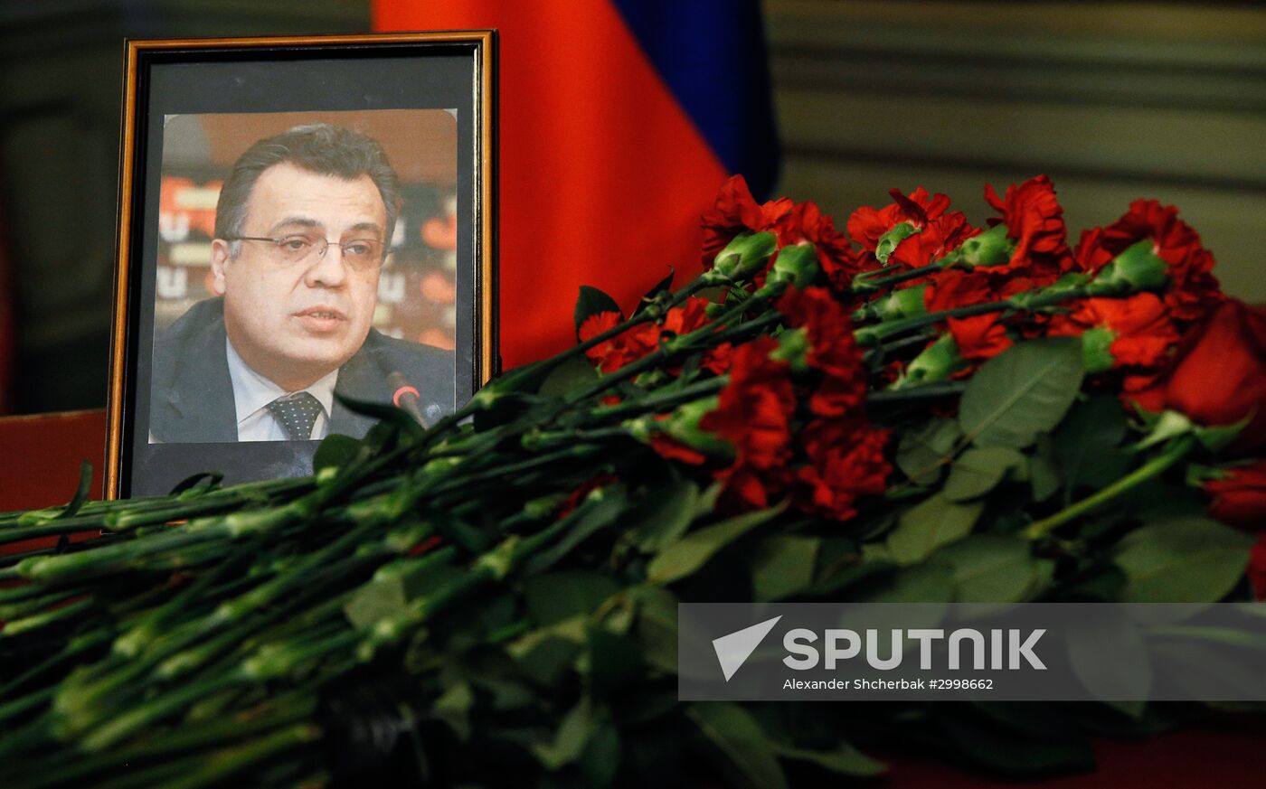 Russian, Iranian, Turkish Foreign Ministers lay flowers in memory of slain Ambassador Andrei Karlov