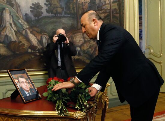 Russian, Iranian, Turkish Foreign Ministers lay flowers in memory of slain Ambassador Andrei Karlov