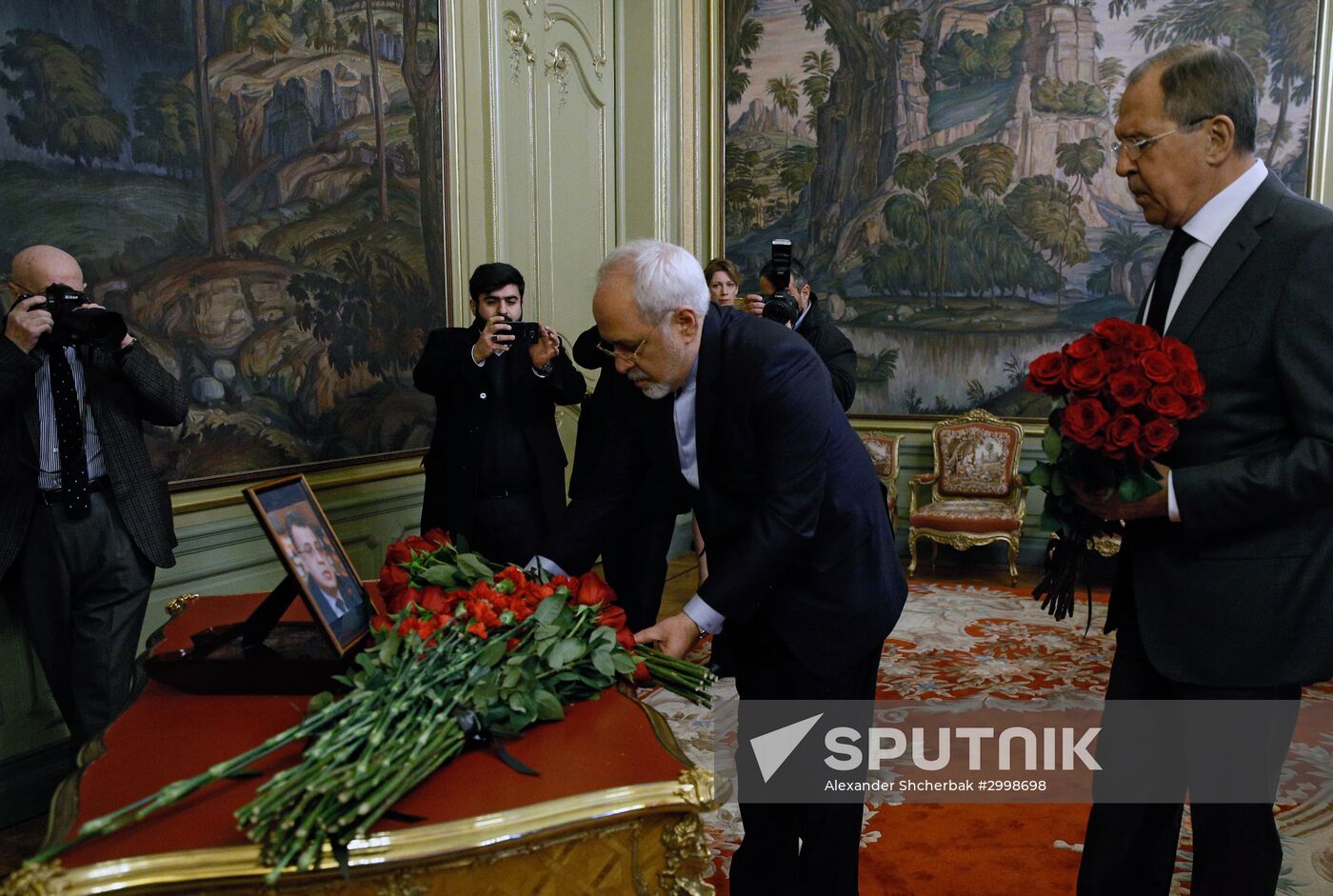Foreign ministers of Russia, Iran, Turkey lay flowers in memory of Ambassador Andrei Karlov