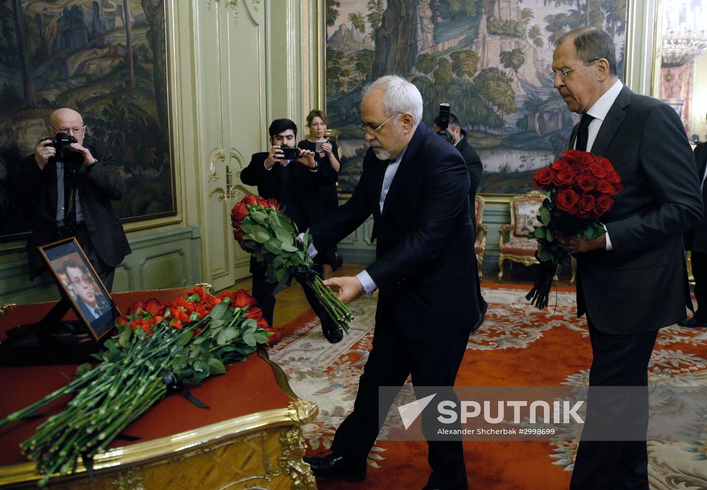 Foreign Minister Sergei Lavrov, right, and Iranian Foreign Minister Mohammad Javad Zarif lay flowers in memory of the assassinated Russian Ambassador to Turkey Andrei Karlov. Location: Russia, Moscow. Author: Alexander Shcherbak/Sputnik. Foreign ministers of Russia, Iran, Turkey lay flowers in memory of Ambassador Andrei Karlov