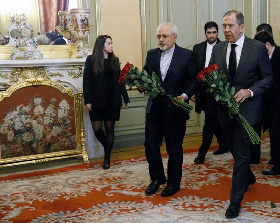 Foreign ministers of Russia, Iran, Turkey lay flowers in memory of Ambassador Andrei Karlov