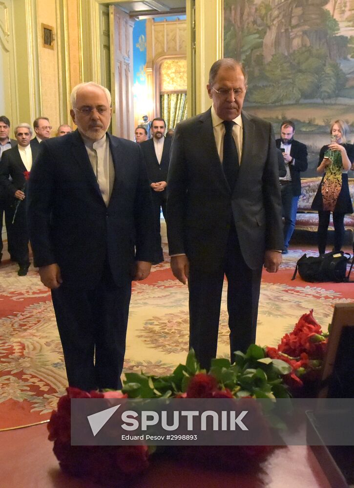 Foreign ministers of Russia, Iran, Turkey lay flowers in memory of Ambassador Andrei Karlov