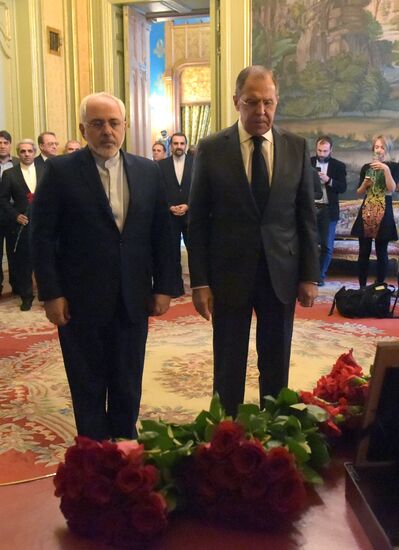Foreign ministers of Russia, Iran, Turkey lay flowers in memory of Ambassador Andrei Karlov