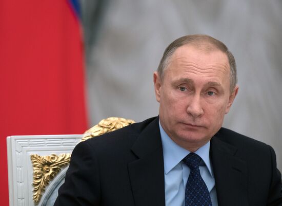 Vladimir Putin meets with Russian Federation Council and State Duma top officials