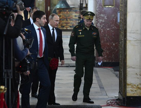 President Vladimir Putin and Prime Minister Dmitry Medvedev pay their last respects to Russian Ambassador to Turkey Andrei Karlov