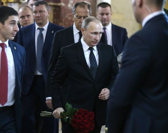 President Vladimir Putin and Prime Minister Dmitry Medvedev pay their last respects to Russian Ambassador to Turkey Andrei Karlov