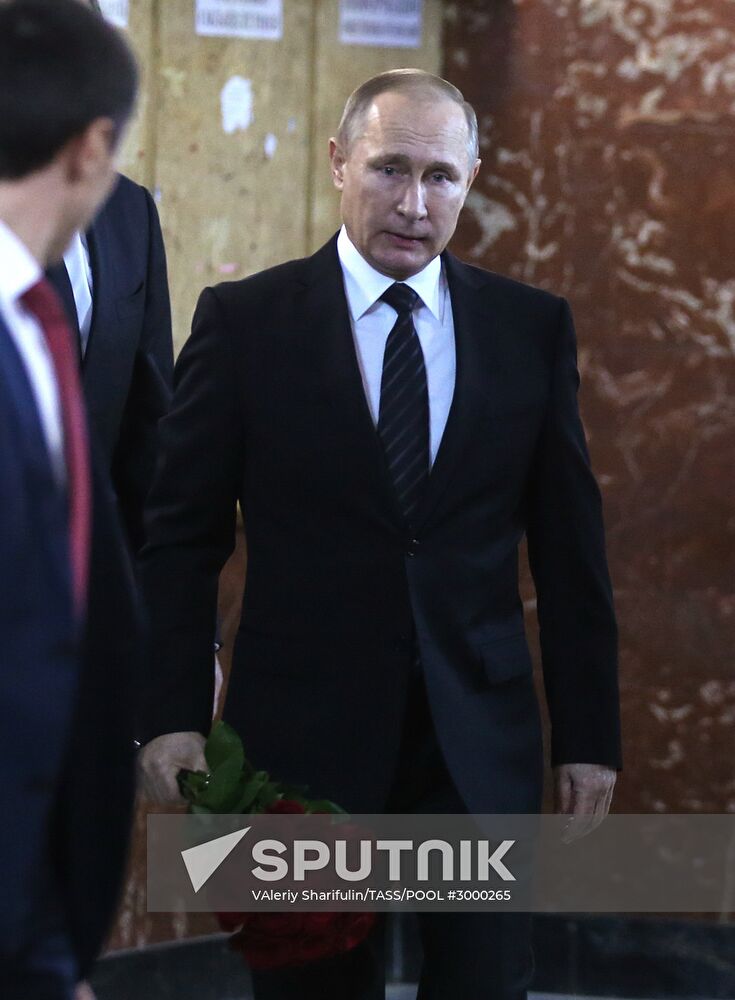 President Vladimir Putin and Prime Minister Dmitry Medvedev pay their last respects to Russian Ambassador to Turkey Andrei Karlov