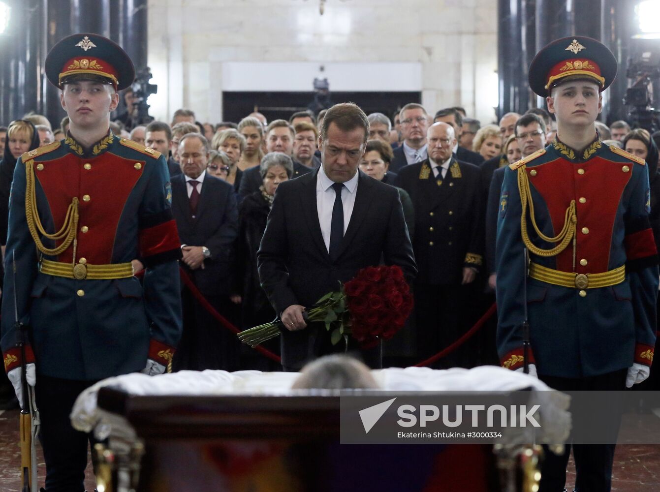 President Vladimir Putin and Prime Minister Dmitry Medvedev pay their last respects to Russian Ambassador to Turkey Andrei Karlov