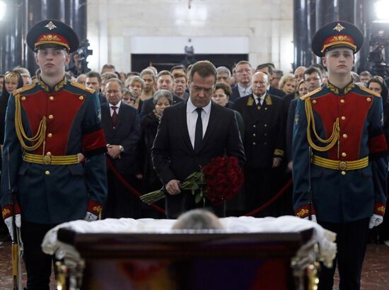 President Vladimir Putin and Prime Minister Dmitry Medvedev pay their last respects to Russian Ambassador to Turkey Andrei Karlov