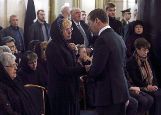 President Vladimir Putin and Prime Minister Dmitry Medvedev pay their last respects to Russian Ambassador to Turkey Andrei Karlov