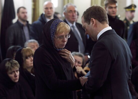 President Vladimir Putin and Prime Minister Dmitry Medvedev pay their last respects to Russian Ambassador to Turkey Andrei Karlov
