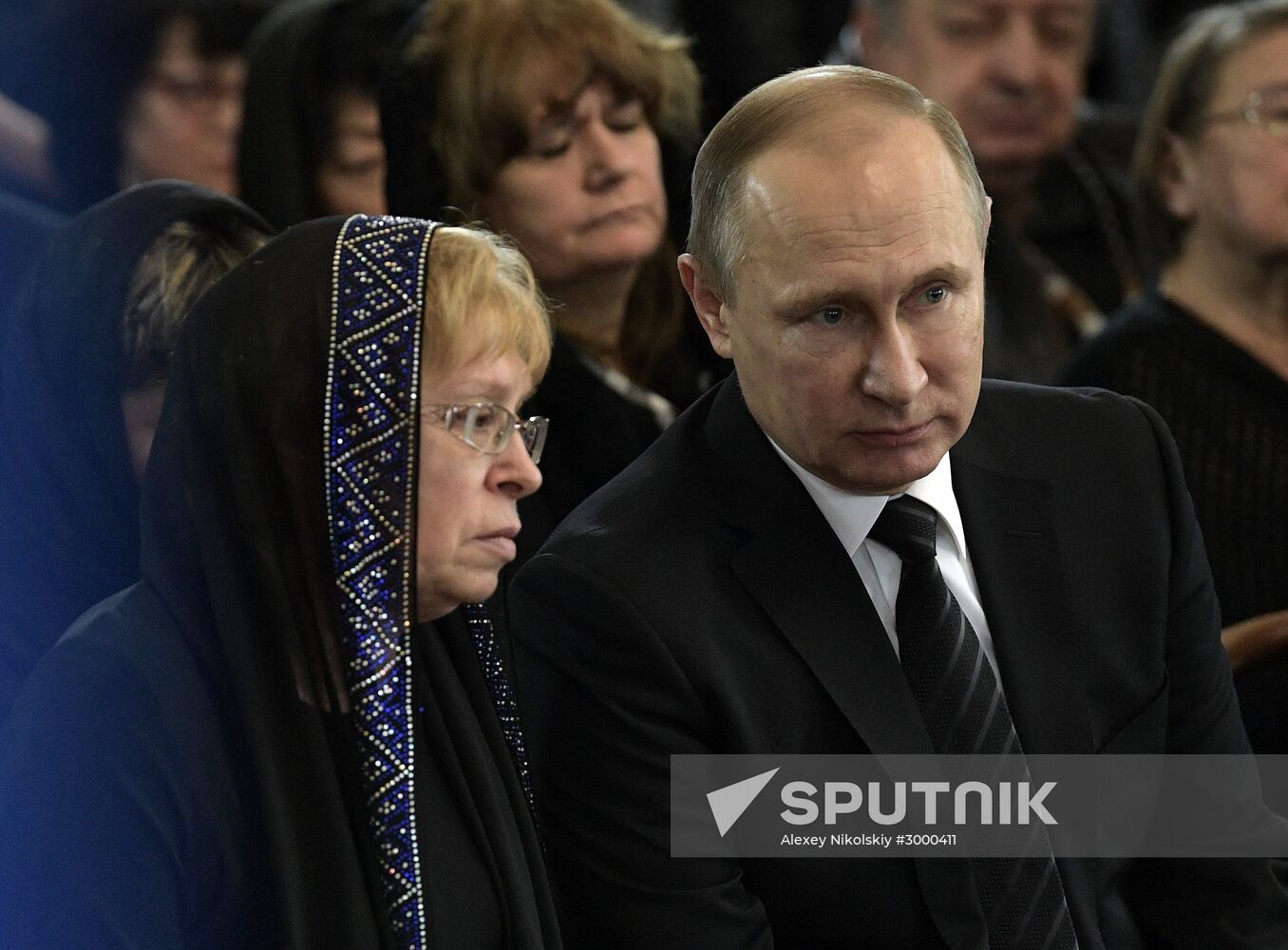 President Vladimir Putin and Prime Minister Dmitry Medvedev pay their last respects to Russian Ambassador to Turkey Andrei Karlov