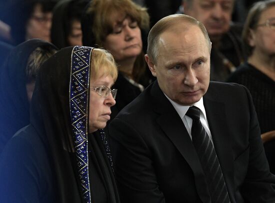 President Vladimir Putin and Prime Minister Dmitry Medvedev pay their last respects to Russian Ambassador to Turkey Andrei Karlov