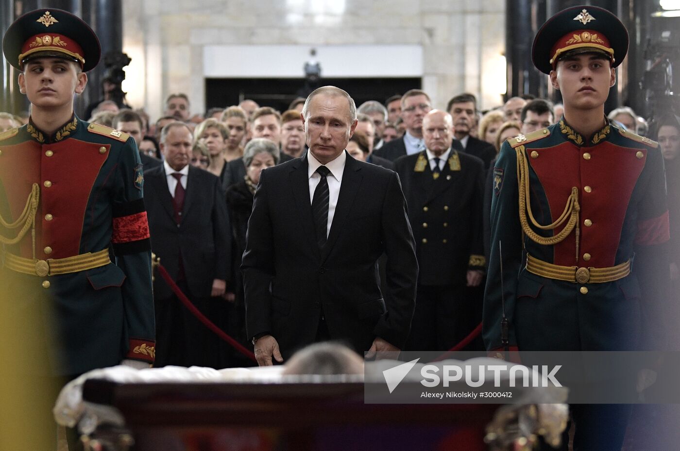 President Vladimir Putin and Prime Minister Dmitry Medvedev pay their last respects to Russian Ambassador to Turkey Andrei Karlov
