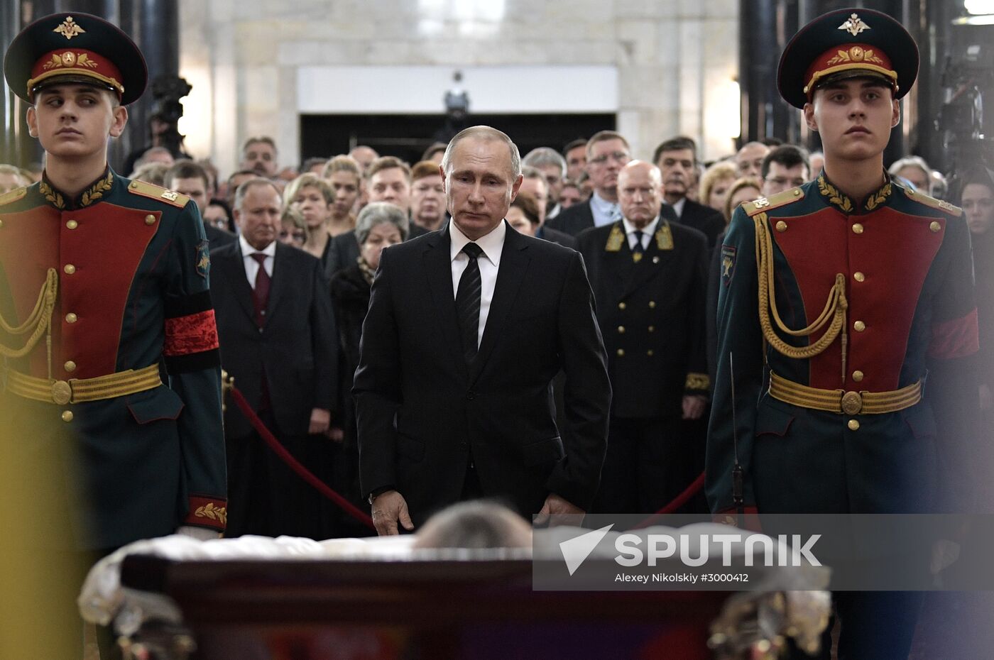 President Vladimir Putin and Prime Minister Dmitry Medvedev pay their last respects to Russian Ambassador to Turkey Andrei Karlov