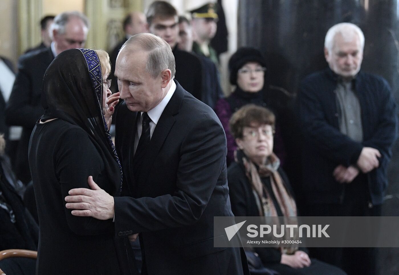 President Vladimir Putin and Prime Minister Dmitry Medvedev pay their last respects to Russian Ambassador to Turkey Andrei Karlov